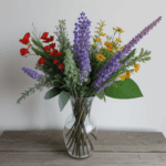 A stylish display of fresh wildflowers in a vase, ideal for brightening any room with natural charm.