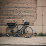 A vintage bicycle leaning against a rustic brick wall, exuding charm and nostalgia.