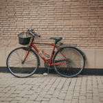Nostalgic image of a bicycle and brick wall, evoking a sense of timeless beauty and peace.