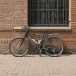 Bicycle artfully positioned against a brick wall, ideal for those seeking vintage photography inspiration.
