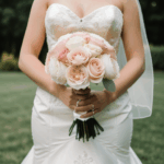 Bouquet and bride glamour captured in a stunning wedding photo.