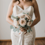 A bridal moment captured beautifully with the bride and bouquet.