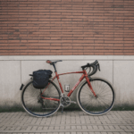 A bicycle against a brick wall, beautifully combining rustic textures with urban charm.