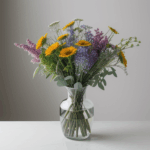 A beautiful arrangement of wildflowers in a vase, bringing a touch of the outdoors indoors.