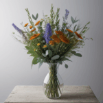Vibrant wildflower arrangement in a vase, perfect for creating an inviting home atmosphere.
