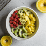 An inviting display of fresh fruits in a bowl, enhancing the kitchen's aesthetic with natural beauty.