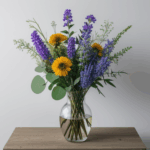 A vibrant bouquet of fresh wildflowers in a decorative vase, adding natural elegance to any room.