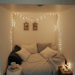 A home library corner with comfortable seating and fairy lights for reading.