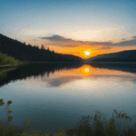 Scenic mountain lake reflecting the colors of sunrise.