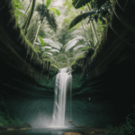 A tranquil jungle waterfall surrounded by vibrant green foliage, perfect for relaxation.