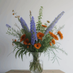 A colorful arrangement of wildflowers beautifully displayed in a vase, perfect for home decor.