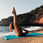Yoga relaxation at the seashore, enhancing mindfulness.